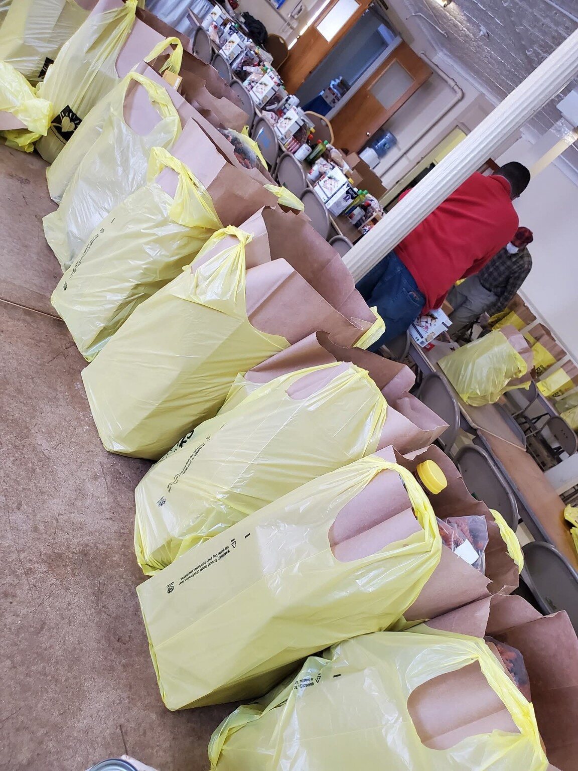 Rows of prepared food bags ready for community distribution